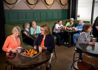 croup of people in brewery