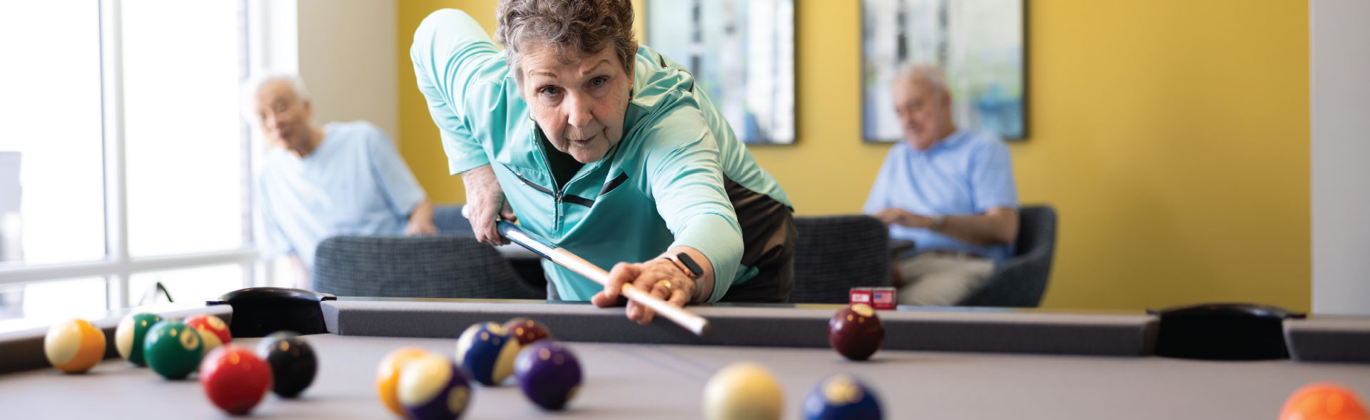 lady playing pool header