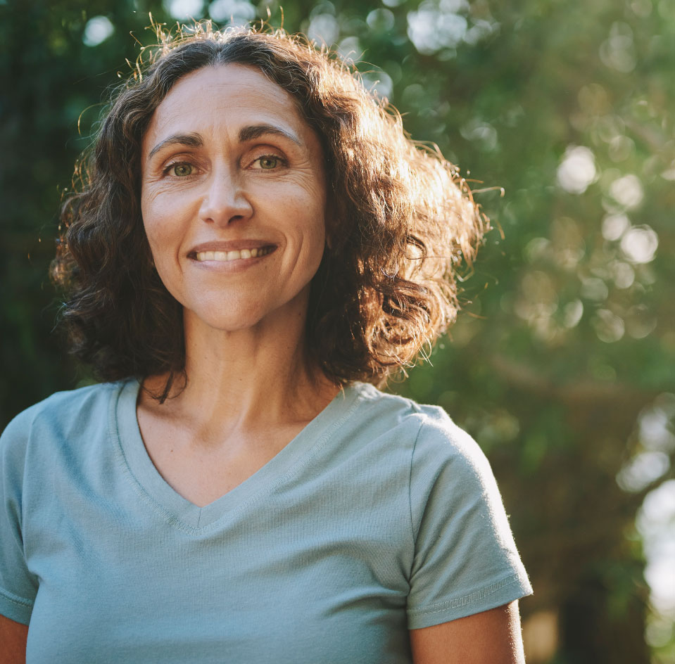 ALMS smiling woman in blue shirt