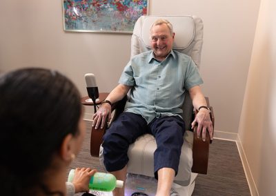 older man getting pedicure