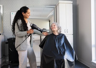 two woman in salon